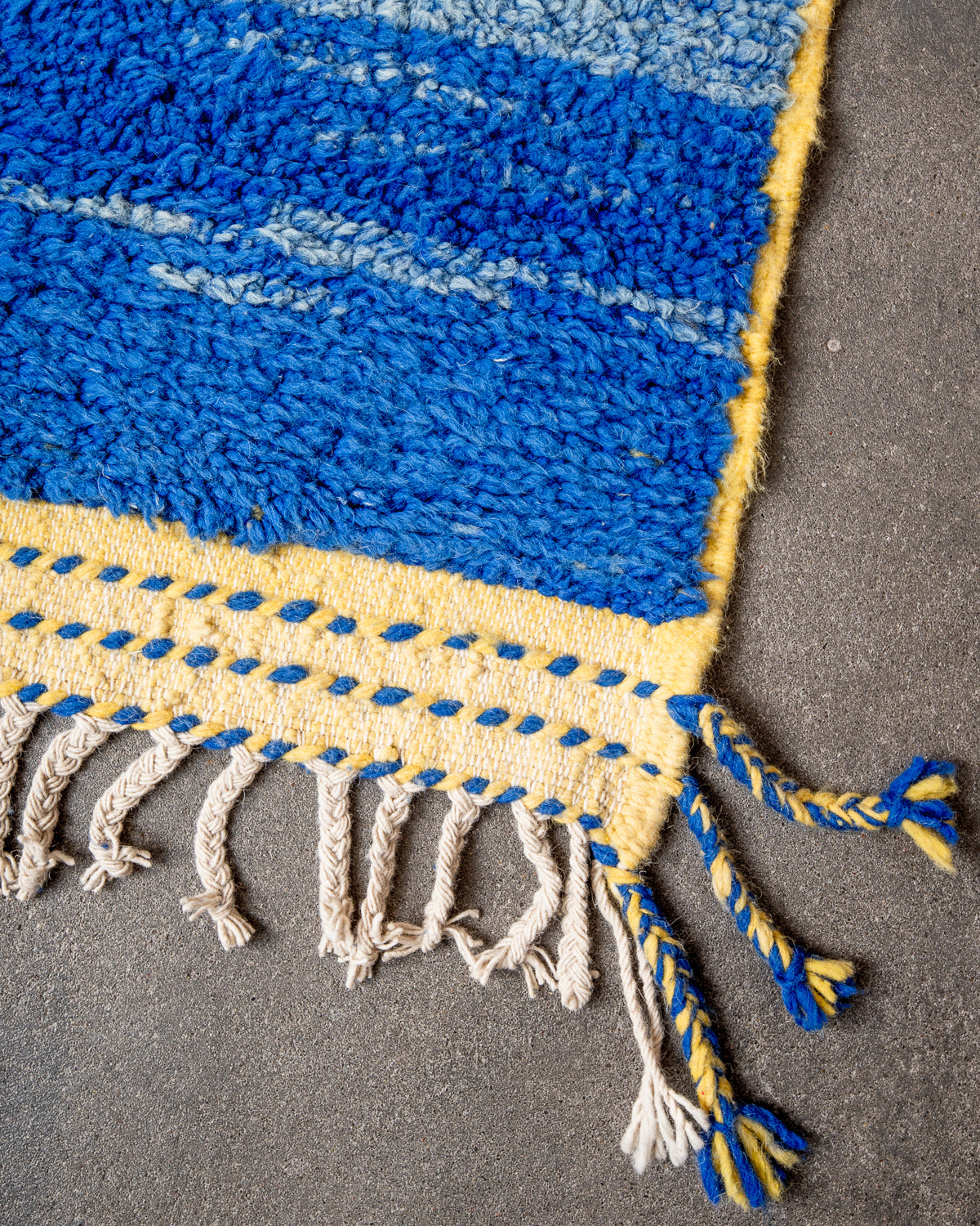 Modern, designer, handcrafted Berber rug from Morocco. Beniourain carpet with beautiful colours and patterns and fluffy wool texture.